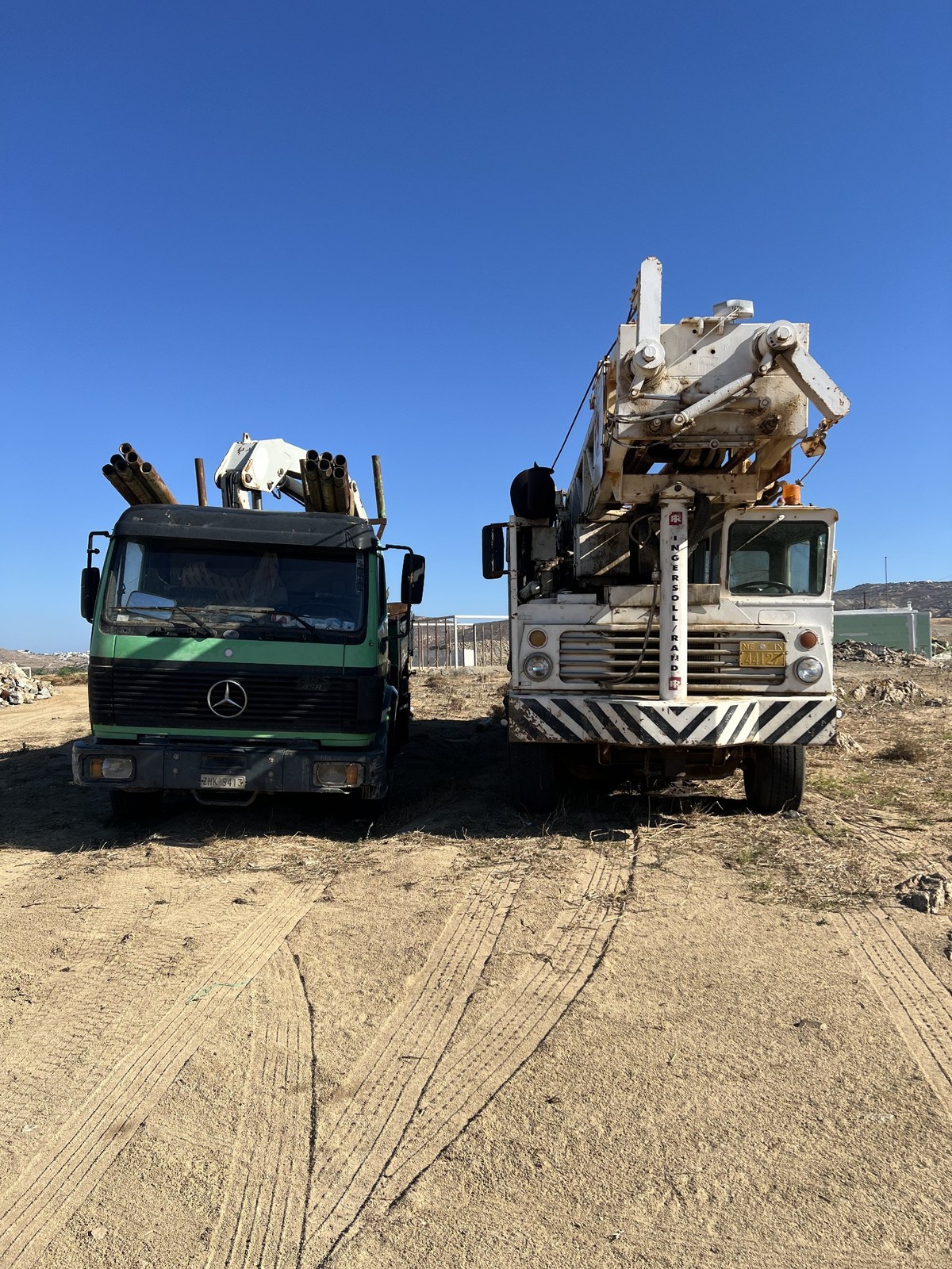 Drilldeck drilling rig and support truck